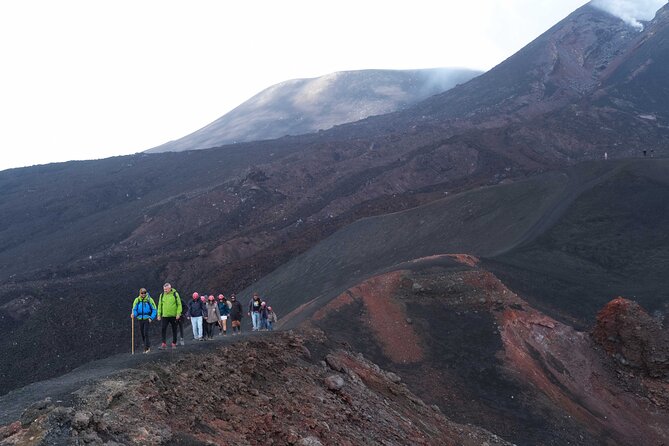 Etna excursion 3000 meters with 4x4 cable car and Trekking - Return by cable car: volcanic sand channels and the downhill views