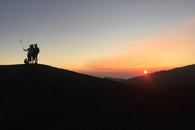 Etna Sunset Tour (starting from Catania) - Inside the lava cave: helmets, flash lights, and real footing