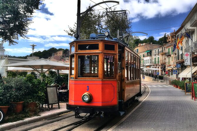 Excursion to Sóller and Puerto de Sóller with train and tram - The Historic Wooden Train Through the Sierra de Tramuntana