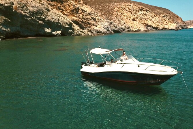 Explore Santorini and its volcanic wonders with Alex Private Boat - Thirassia: clearer water, easy snorkeling, and cheerful music