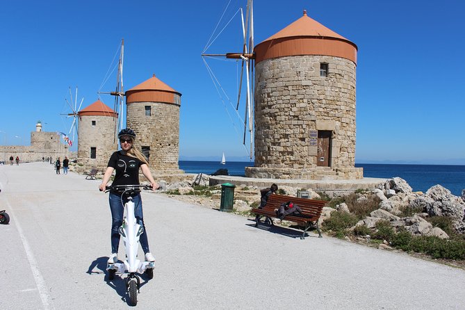 Explore the new town and the medieval town of Rhodes on scooters - 3 hours - Mandraki Harbour to St. Nicola’s Fortress: where the harbor story really clicks