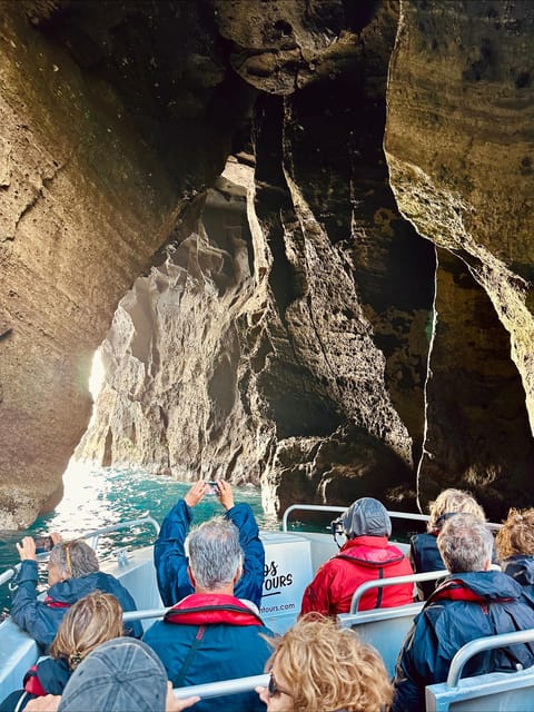 Faial Island: Unique boat tour to the Capelinhos volcano - The boat ride realities: sea conditions, protective gear, and motion
