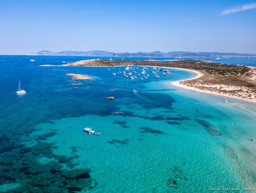 Formentera: Crystal Waters Cruise with Snorkeling and Lunch - Cala Saona: the first anchor drop and the snorkeling moment