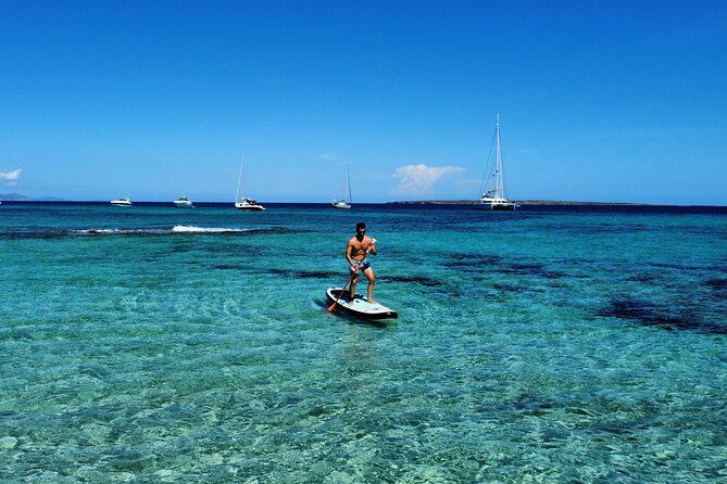 Formentera & Espalmador: Full-Day Private Sailboat Trip - Stop 3: Cala Saona for Rocky Coves and Paddle Around Hidden Caves