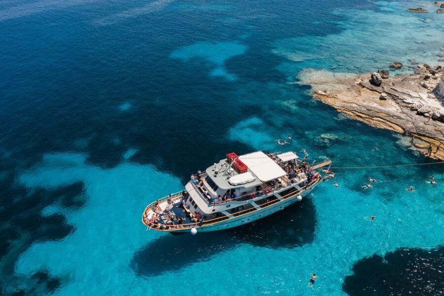 From Benitses/Lefkimmi: Paxos, Antipaxos & Caves Day Cruise - Voutoumi Beach swim: your one real stretch of beach time