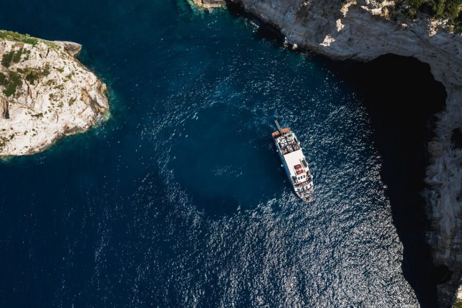 From Benitses/Lefkimmi: Paxos, Antipaxos & Caves Day Cruise - On-board experience: crowd levels, bar energy, and sanity tips