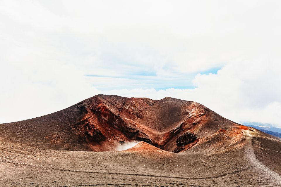 From Catania: Mt. Etna, Wine and Alcantara Tour - Lava caves with helmets and lamps: Grotta time done right
