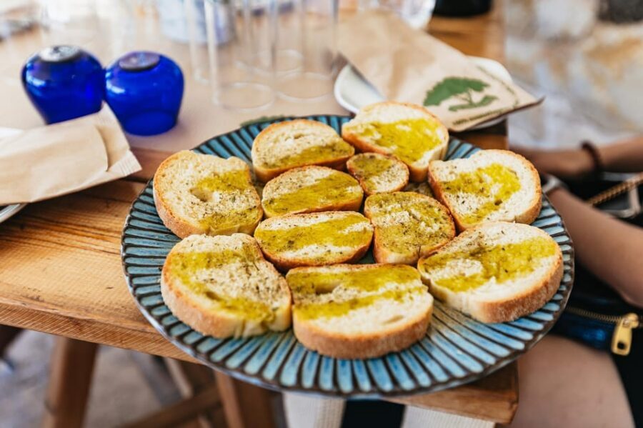 From Chania: Wine and Olive Oil Tasting Tour with Snacks - Winery stop #1: a family operation with modern ideas and real grape tasting
