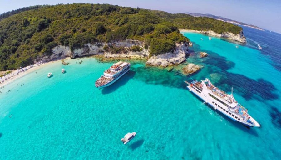 From Corfu Island: Antipaxos & Paxos Blue Caves Boat Cruise - Inside the Blue Caves of Paxos: where the photos really happen