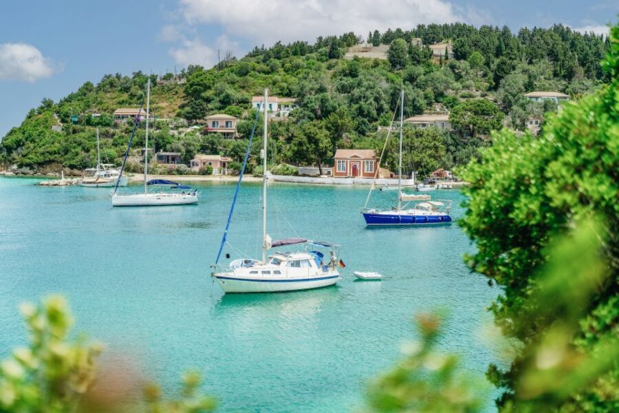 From Corfu Island: Antipaxos & Paxos Blue Caves Boat Cruise - Antipaxos swim stop at Mesovrika or Voutoumi: turquoise, time limits, and entry tips