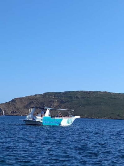 From Fornells: North Coast Beaches Cruise with Swim Stops - Your 3.5-Hour Route: Lighthouses, Roman Port, and Shell-Shaped Cala Mica