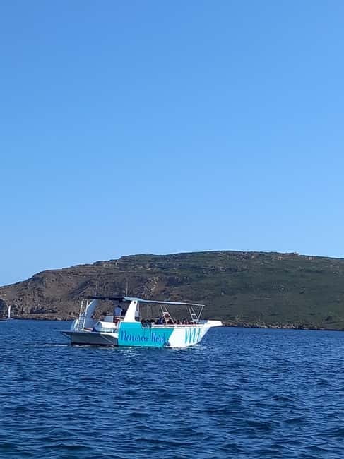 From Fornells: North Coast Beaches Cruise with Swim Stops - Your 3.5-Hour Route: Lighthouses, Roman Port, and Shell-Shaped Cala Mica