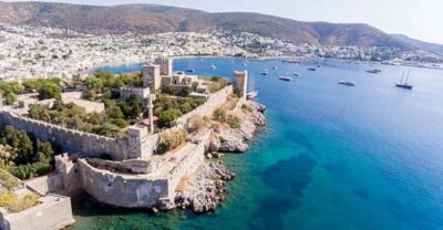 From Kos: Oriental Bus Tour Bodrum w/Roundtrip Ferry&Pickup - Guided Bodrum bus tour: how the route fits history and city sights