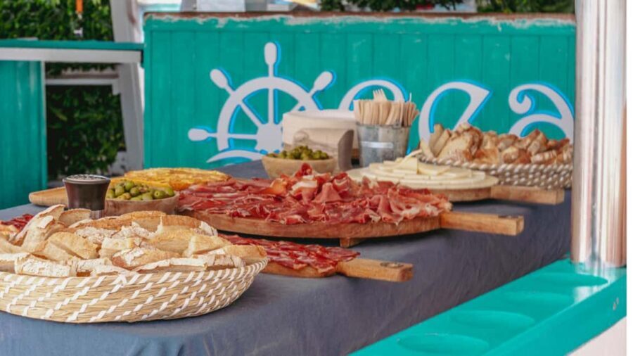 From Magaluf: Palma Bay Sightseeing Cruise with Live Music - Lunch buffet on deck: Spanish omelette, ham, salad, fruit