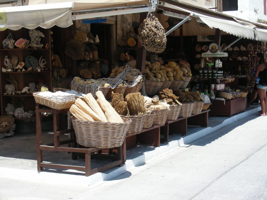 From Rhodes: Boat Trip to Symi Island with Hotel Transfer - Symi’s waterfront: pastel houses, painted boats, and coast sponges