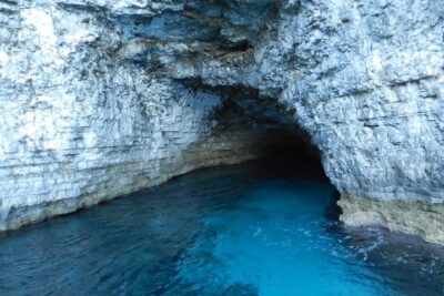 From Sliema: Malta Cruise to Blue Lagoon, Crystal Lagoon & Caves - Malta coast cruise before Comino: the bays you pass are part of the show