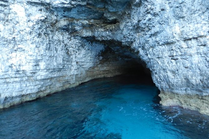 From Sliema: Malta Cruise to Blue Lagoon, Crystal Lagoon & Caves - Malta coast cruise before Comino: the bays you pass are part of the show