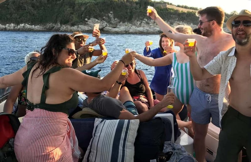 From Sorrento: Full-Day Boat Tour to Capri with Drinks - Grotto stops: White, Green, Heart, Champagne, and the Blue question