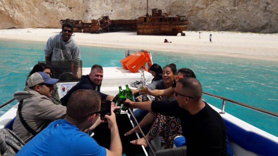 From St.Nikolaos: Boat Cruise to Navagio Beach & Blue Caves - Blue Caves by glass-bottom boat: seeing fish and staying cool in the shade