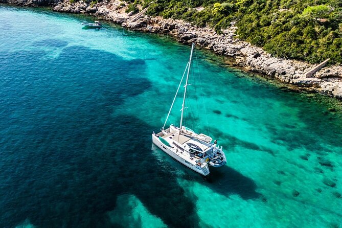 Full day catamaran tour in Alghero - Key Highlights at a Glance