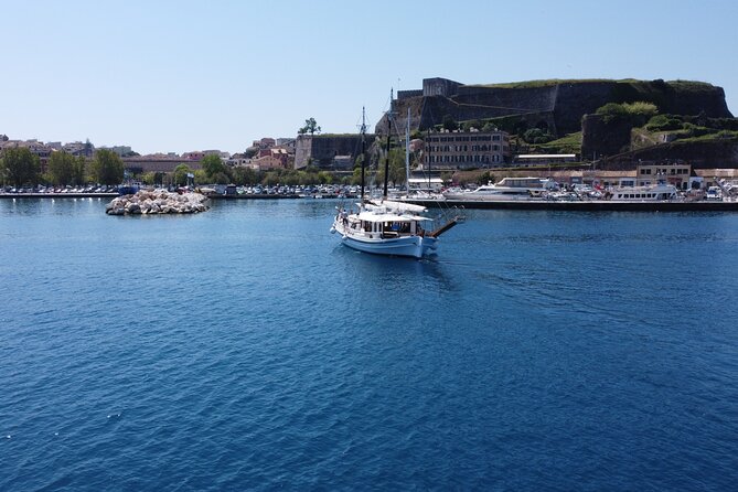 Full Day Cruise from Corfu in Classic Wooden Vessel, Swim & BBQ - Picking your spot on the boat for shade and comfort