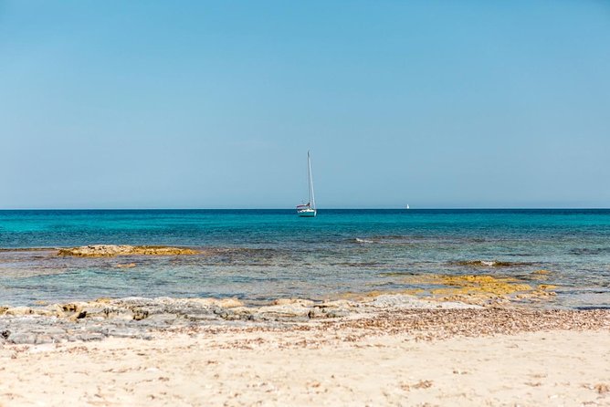 Full-Day Private Ibiza and Formentera Charter Cruise - Stop 1: sailing the hidden corners around Ibiza and Formentera
