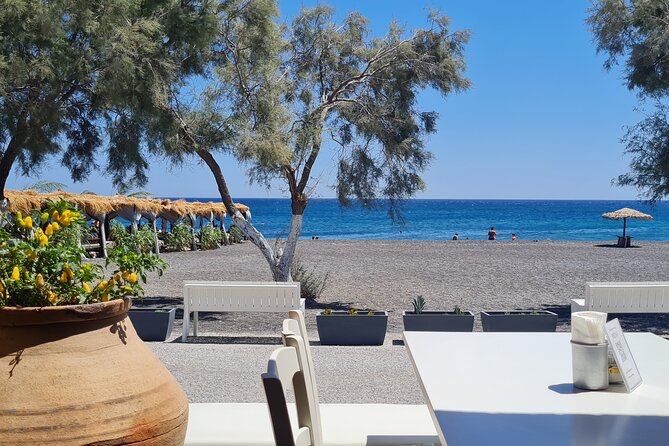 Full-Day Private Tour of Santorini Caldera & The Most Famous Sightseeing - Megalochori: Traditional Stones, Vineyards, and Pirate-Protection Cave Houses