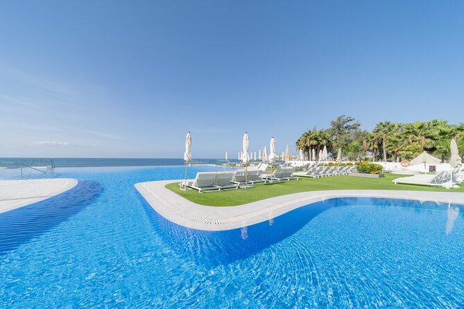 Full Day Ticket at Perchel Beach Club with Lunch - Is it a real beach, or more of a pool club?
