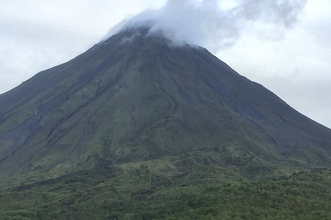 Full Day Tour with Safari Float, Waterfall and Volcano Hike - Arenal Volcano hike: slow rainforest trail to old lava views