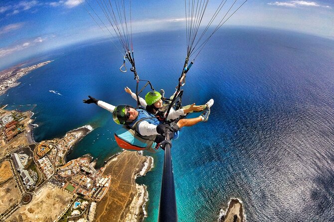 GOLD paragliding flight including videos/photos, t-shirt and a bottle of Cava - La Caleta Beach Landing (and Why It Sometimes Changes)