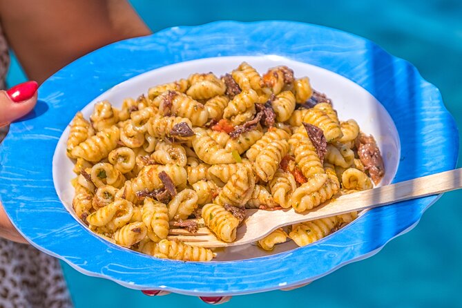 Guided day by boat in Carloforte with snorkelling and aperitif - Cala Mezzaluna: The Snorkelling Break That Changes Your Perspective