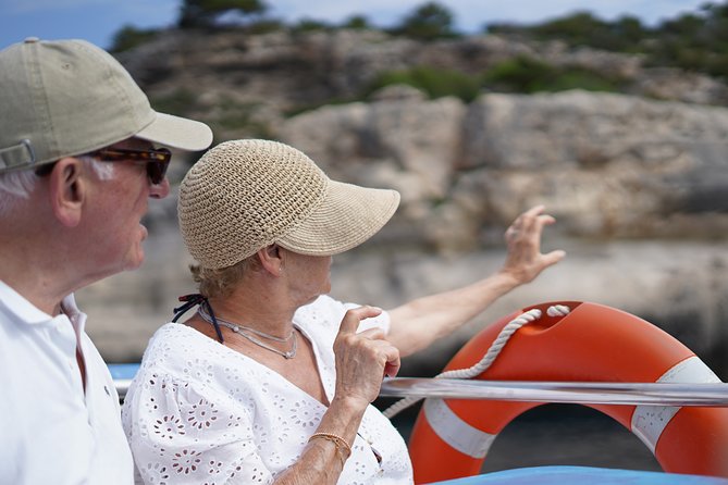 Half-Day Boat Tour along The South Coast of Menorca - Onboard comfort: restroom, coffee bar, glass-bottom views, and slides