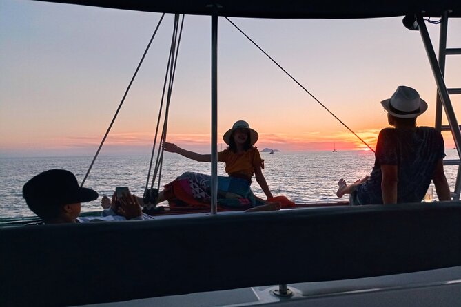 Half-Day Exclusive Catamaran Cruise in Santorini with Meal and Open Bar - Thirassia Island snorkeling and the onboard BBQ meal