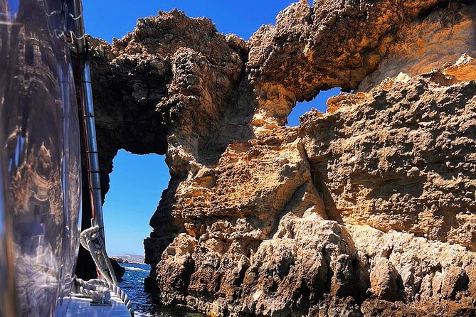 Half Day Malta Tour to Gozo Comino and Blue Lagoon Caves - Santa Maria Caves and Elephant Rock: the photo stop that becomes an actual cave moment