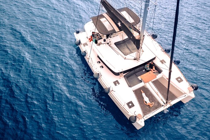 Half Day Premium Catamaran Cruise in Santorini including Oia - The Route: Red Beach, Warm Volcano Waters, and Thirassia