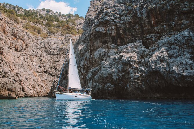 Half Day Private Sailing Tour along the Tramuntana Coast - The boat setup: restroom, shade, snorkeling, and paddle surfing