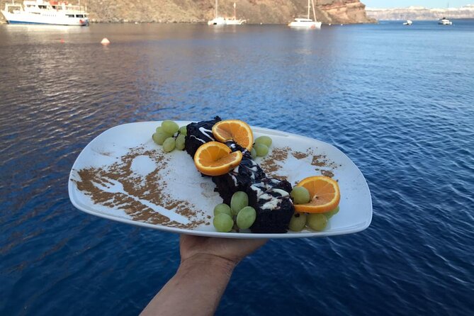 Half-Day Tailor-made Private Catamaran Cruise in Santorini - Red Beach: color, cliffs, and 20 minutes that go fast