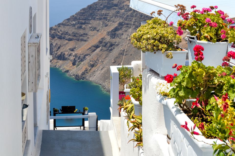 Heraklion: Santorini Day Trip with Boat Transfer & Oia Visit - Escorted Bus Touring: Crete and Santorini History Without Feeling Like a Lecture