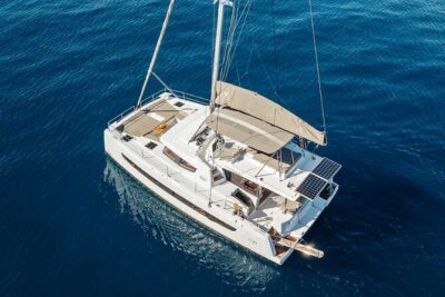 Hersonissos: Luxury Sunset Catamaran Cruise Sushi & Open Bar - Saint George Bay and the Agios Georgios chapel: the swim stop