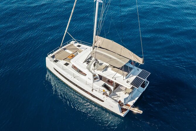 Hersonissos: Luxury Sunset Catamaran Cruise Sushi & Open Bar - Saint George Bay and the Agios Georgios chapel: the swim stop