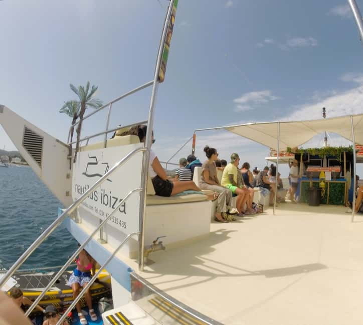 Ibiza: Es Vedrà Boat Tour with Swimming Stop - The vibe on board: friendly crew, not-too-crowded energy