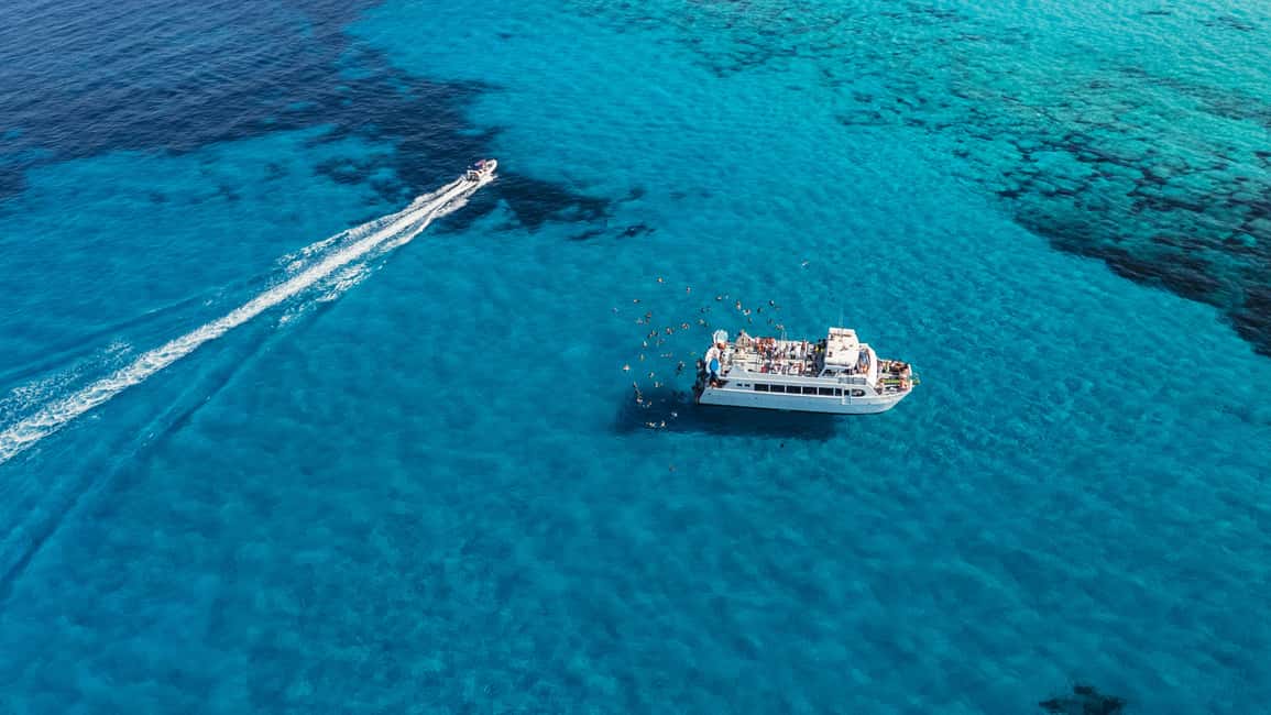 Ibiza: Formentera Boat Cruise with Paddle, Snorkel & Lunch - The cruise out of Ibiza: pretty views with a purpose