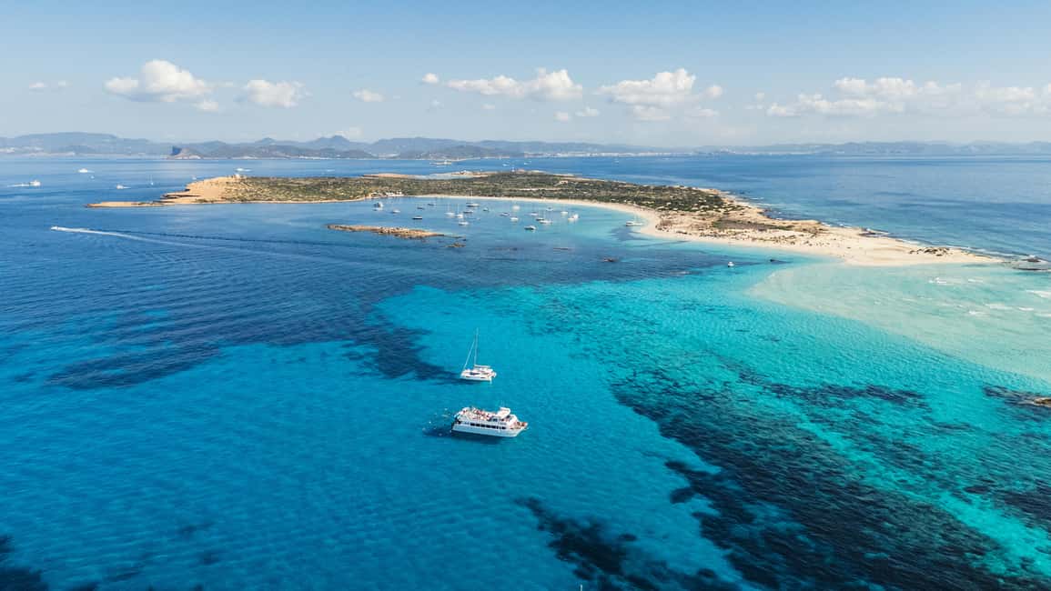 Ibiza: Formentera Boat Cruise with Paddle, Snorkel & Lunch - Meeting at Playa den Bossa and getting your day started