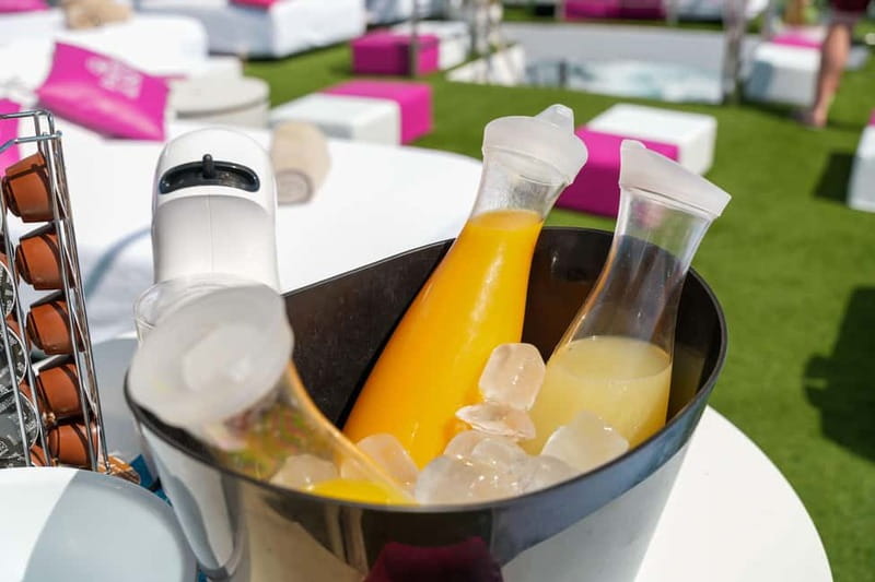 Ibiza: Formentera Cruise w/Breakfast, Paella, and Open Bar - On-board comfort, slide time, and live music for the ride back