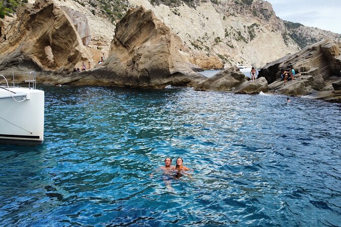 Ibiza & Formentera Private Catamaran Full-Day Sailing Tour - Espalmador’s water time: paddle boards and snorkeling between Ibiza and Formentera
