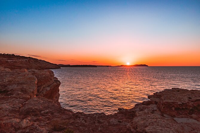 Ibiza Midday or Sunset Sailing with Light Snacks and Open Bar - Cruising the Bay of San Antonio with live local commentary