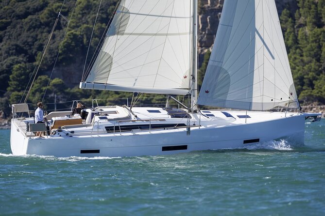 Ibiza Midday or Sunset Sailing with Light Snacks and Open Bar - The swim stop: what you do in crystal-clear anchorage