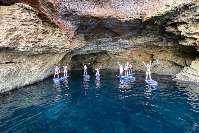 Ibiza Morning Paddle Board Tour - Rock jumps from the rocks: fun option, not a requirement
