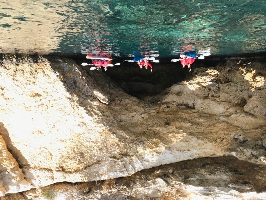 Ibiza: Sea Kayaking at Sunset and Sea Caves Tour - Portinatx sunset: the included toast and the sea-level view