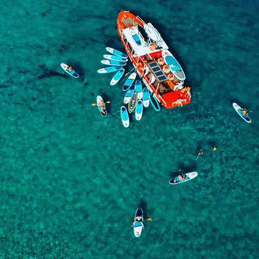 Ibiza: Secret Coves Guided Boat Tour with Open Bar and Tapas - The Boat Setup: Loungers, Restroom, and a Deck Made for Sun